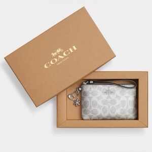 Coach Corner Zip Wristlet In Signature Canvas With Charms | Gift Box